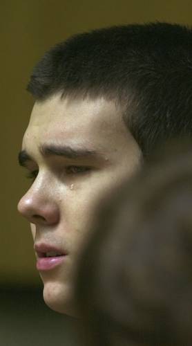 James Parker sheds tears on Thursday, April 4, 2002 during his sentencing hearing in Grafton County Superior Court in Haverhill, New Hampshire. Parker, who has served more than half of his life in prison for his role in the 2001 stabbing deaths of two married Dartmouth College professors as part of a plan to rob and kill people before fleeing overseas, was granted parole on Thursday.