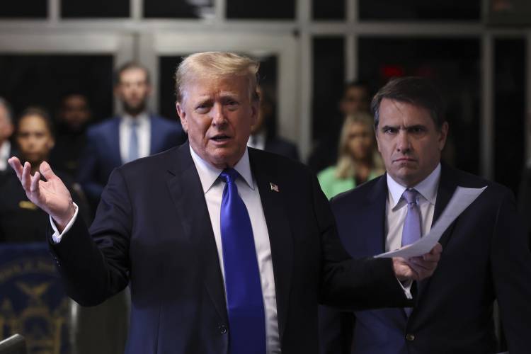 Former President Donald Trump speaks to the media as he arrives at Manhattan criminal court during jury deliberations in his criminal hush money trial in New York, Thursday, May 30, 2024. (Michael M. Santiago/Pool Photo via AP)