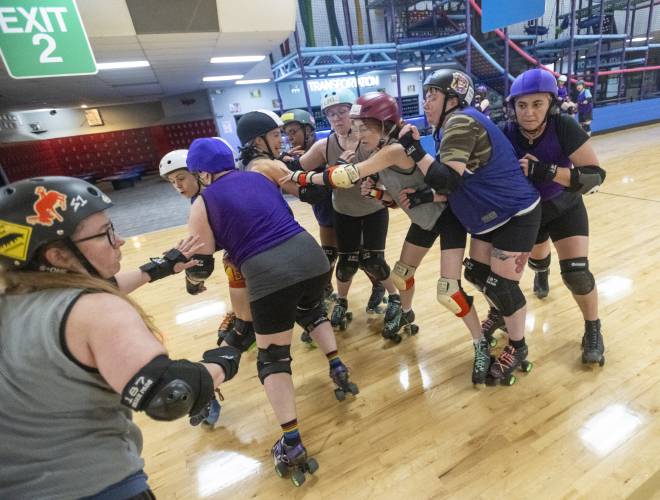 Members of the Western Massachusetts Roller Derby run drills during a practice at Interskate 91 South, Thursday, April 3, 2025, in Wilbraham.