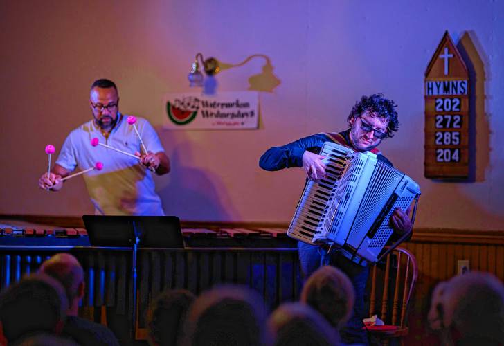 Cory Pesaturo, on accordion, and Drew Tucker, on vibraphone, perform for a Watermelon Wednesdays concert at the West Whately Chapel.