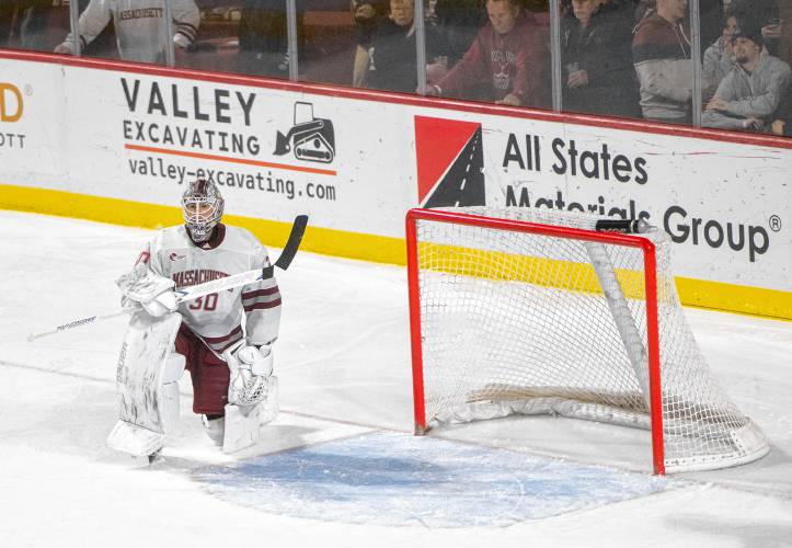 UMass goalie Michael Hrabal (30) takes a knee after allowing a goal during the college hockey game against Boston College at the Mullins Center, Saturday, Feb. 15, 2025, in Amherst.