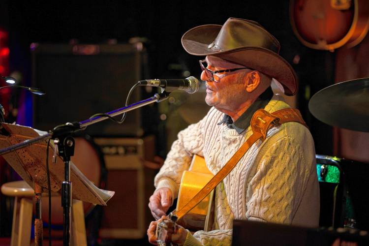 Louis Lamothe of West Springfield sings an orginal song during a Wednesday open mic night at Luthier's Co-op in Easthampton.