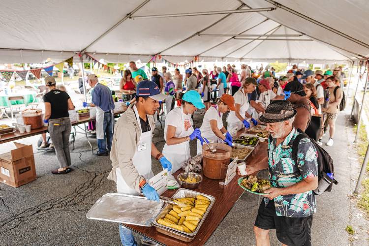 Meals are served during the 2023 Harvest Supper on the Greenfield Common. The 19th annual event will be held Saturday, Aug. 24, from 4 to 7 p.m.