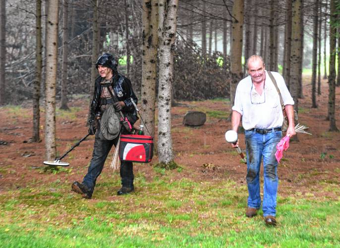  Field Director David Naumec, left, and Chief Archaeologist Kevin McBride, both of Connecticut-based archaeological consulting group Heritage Consultants, emerge from a property on Colorado Avenue in Greenfield where they have been conducting archaeological digs.