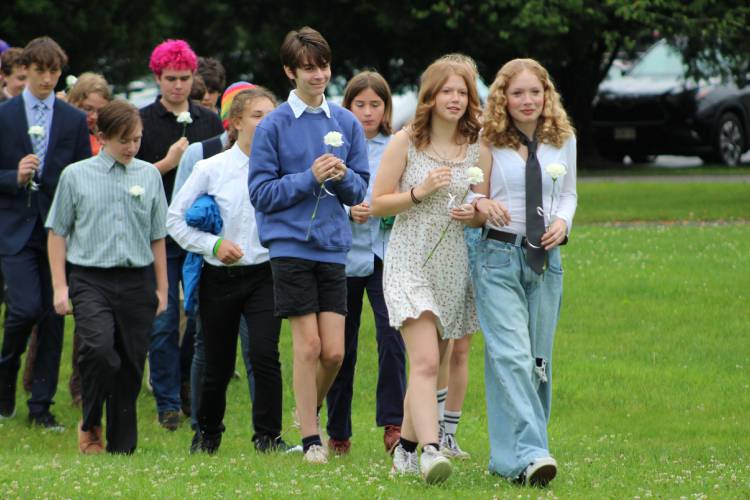 Younger students lead the Class of 2025 into The Academy at Charlemont’s commencement ceremony on Saturday.