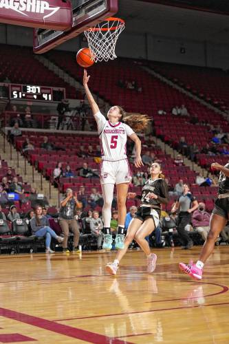 Kristin Williams (5) glides in for an easy two during UMass’ 58-45 win over St. Bonaventure on Wednesday night at the Mullins Center. Kristin Williams (5) glides in for an easy two during UMass’ 58-45 win over St. Bonaventure on Wednesday night at the Mullins Center.