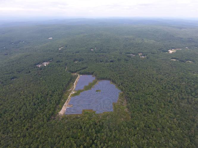 This August 2021 aerial photo shows a 30-acre solar array on land owned by W.D. Cowls off Pratt Corner Road in Shutesbury. This August 2021 aerial photo shows a 30-acre solar array on land owned by W.D. Cowls off Pratt Corner Road in Shutesbury.