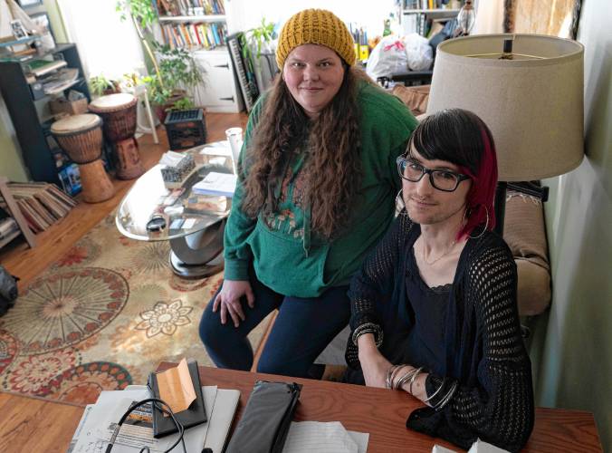 Tásha Pearce, a virtual peer specialist and community bridger, and Ephraim Akiva, the senior director of peer respite with Wildflower Alliance  in the Afiya house in Northampton.


 