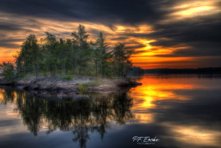Peter Esche of Northfield was awarded best in show for his piece “Sunrise in Voyageurs National Park.”
