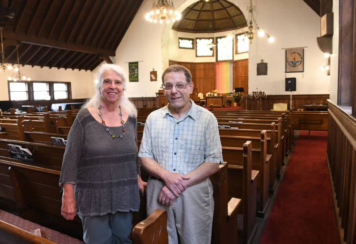 Greenfield’s All Souls Church Chair of Worship Kate Mason and Membership and Heritage Committee member Russ Pirkot.