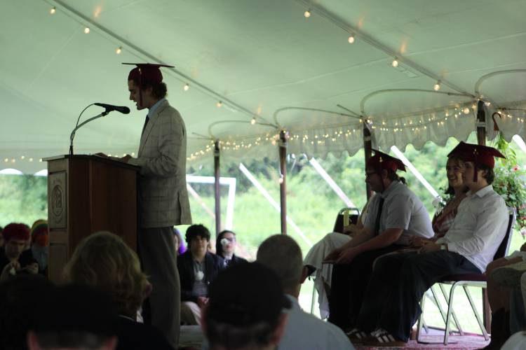 Graduating senior Oleander Brenizer speaks during The Academy at Charlemont’s commencement ceremony on Saturday.