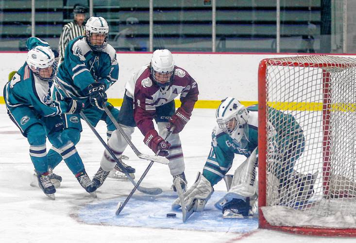 Amherst’s Skyler Ferro (2) takes a shot on Greenfield goalkeeper Cooper Smith (31) earlier this season at Orr Rink in Amherst. Amherst’s Skyler Ferro (2) takes a shot on Greenfield goalkeeper Cooper Smith (31) earlier this season at Orr Rink in Amherst.