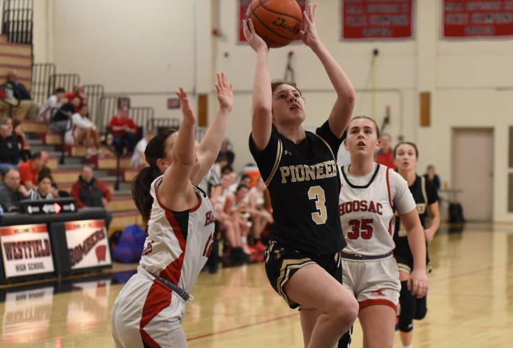 Pioneer’s Addie Harrington goes up for a layup against Hoosac Valley in the Western Mass. Class D finals this season. 