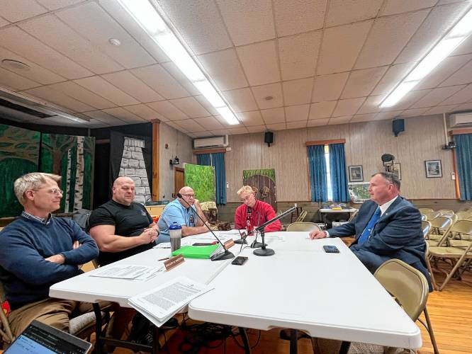Gill Police Chief Christopher Redmond, at right, has renewed his contract with the town. Gill Police Chief Christopher Redmond, at right, has renewed his contract with the town.