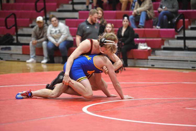 Athol’s Aiden Kirwan competes against Mohawk Trail’s Oliver Schwenger-Sartz on Tuesday at Mallet Gymnasium.