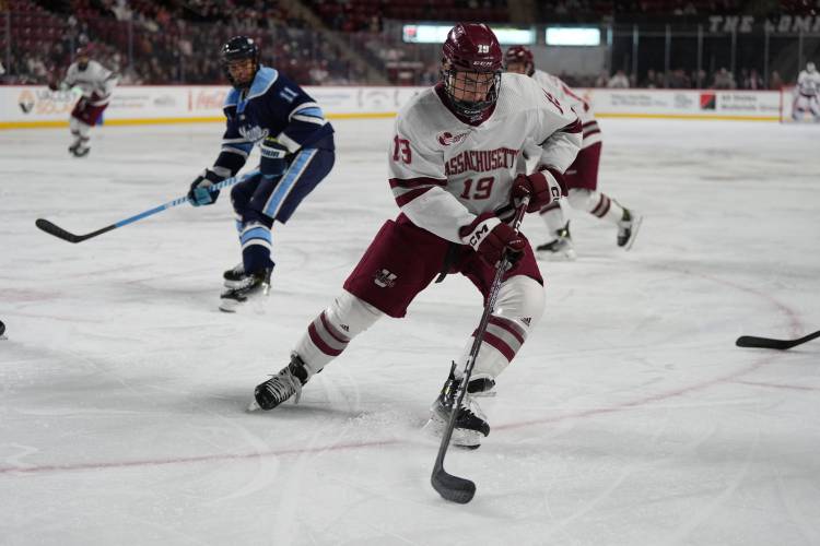UMass’ Cole O’Hara retrieves the puck against Maine earlier this season at the Mullins Center. UMass’ Cole O’Hara retrieves the puck against Maine earlier this season at the Mullins Center.
