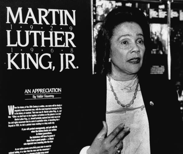 Coretta Scott King speaks at a meeting of the Martin Luther King Jr., Federal Holiday Commission on Capitol Hill in Washington, March 4, 1986. King, chairperson, thanked the members of the commission for their work in making the January 20th holiday a success.