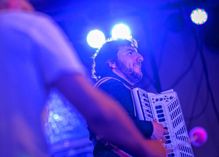 Cory Pesaturo performs on accordion during a Watermelon Wednesdays concert at the West Whately Chapel earlier this month. The acoustic music series is celebrating 25 years.
