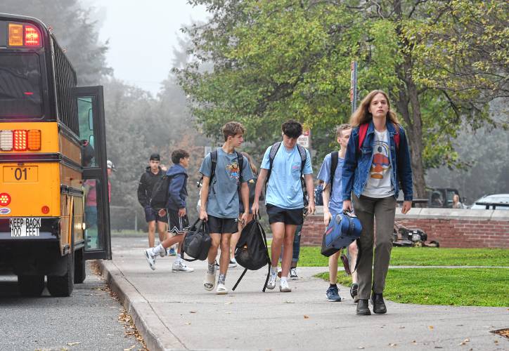Students arrive for the first day of school at Frontier Regional School in South Deerfield on Tuesday.