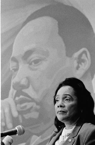 Coretta Scott King, widow of the Rev. Martin Luther King, Jr., is shown at a news conference in Atlanta on Jan. 11, 1986, announcing 10 days of events for the first federal holiday honoring the slain civil rights leader.