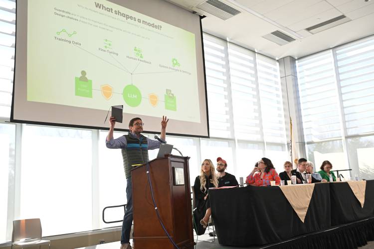 Thomas Bernardin, who serves as executive director of the Center for Data Science and Artificial Intelligence, and senior director of research computing and emerging technology at the University of Massachusetts Amherst, speaks at the Franklin County Chamber of Commerce breakfast at Greenfield Community College Friday morning.