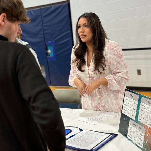 Michelle Bettencourt of A.H. Rist Insurance Agency at Financial Reality Fair at Franklin County Technical School in April.