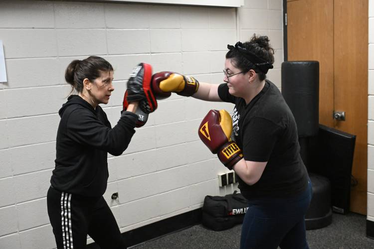 Vanessa Chakour leads Greenfield Recorder reporter Madison Schofield through a brief 20 minute lesson at Franklin County’s YMCA in Greenfield.
