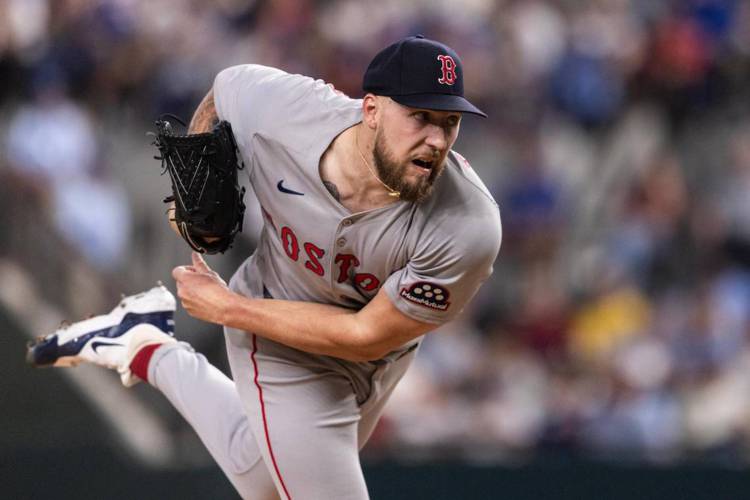 Boston Red Sox pitcher Garrett Crochet (35) throws a pitch in the first inning against the Texas Rangers at Globe Life Field in Arlington, Texas, on Thursday.