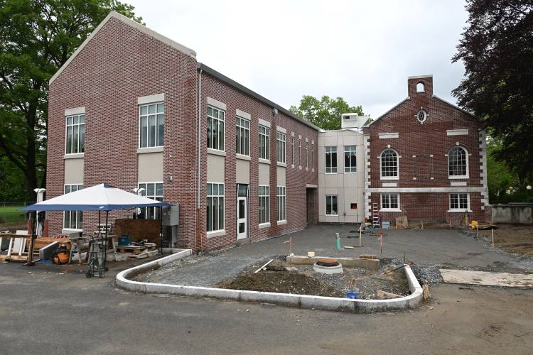 The new addition, left, and the old Tilton Library in South Deerfield.