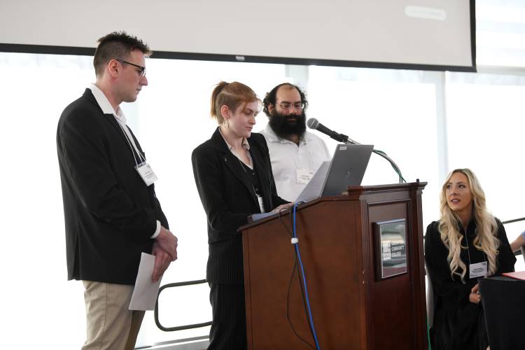 Members of Greenfield Community College’s Artificial Intelligence Innovators Club speak at the Franklin County Chamber of Commerce breakfast at GCC Friday morning. From left are Ernie Royer, Casey Aubrey and Cody Wilson. 