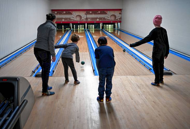 Kids and the grandparents who take care of them bowl at the French King Bowling Center in Erving.