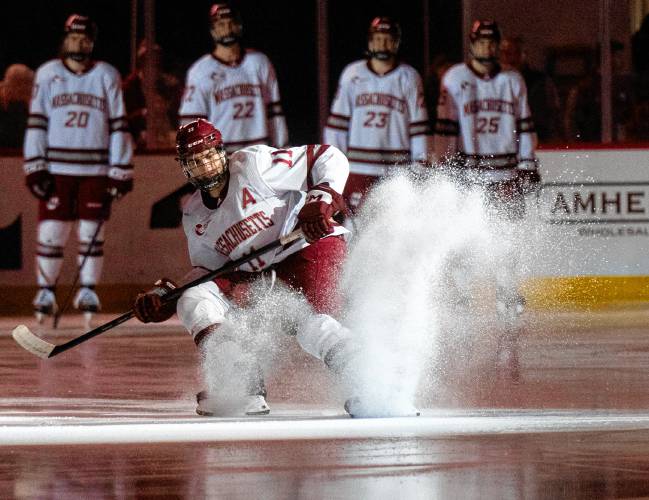 UMass center Lucas Mercuri (11) is introduced before the NCAA hockey game against Alaska at the Mullins Center, Friday, Jan. 24, 2025, in Amherst.