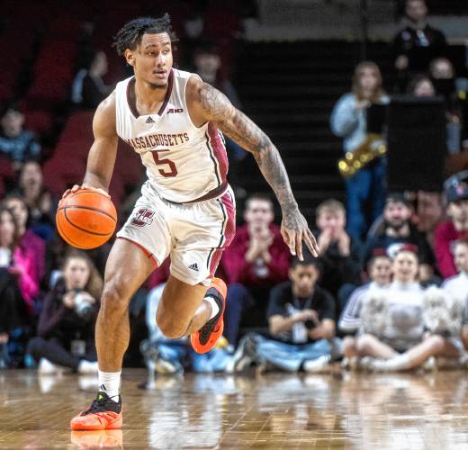 UMass forward Daniel Rivera (5) controls the ball during the college basketball game against Davidson at the Mullins Center, Wednesday, Feb. 12, 2025, in Amherst.