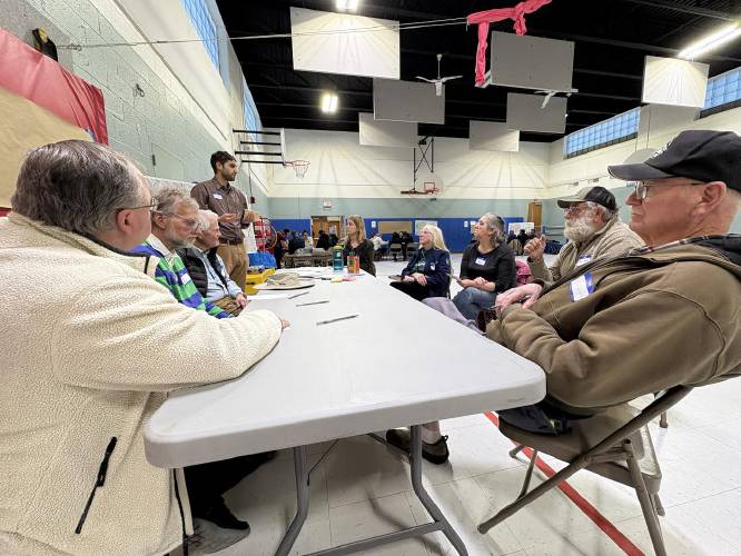 Community members discuss how they envision the future of Charlemont during a Master Plan brainstorming session at Hawlemont Regional School last week.