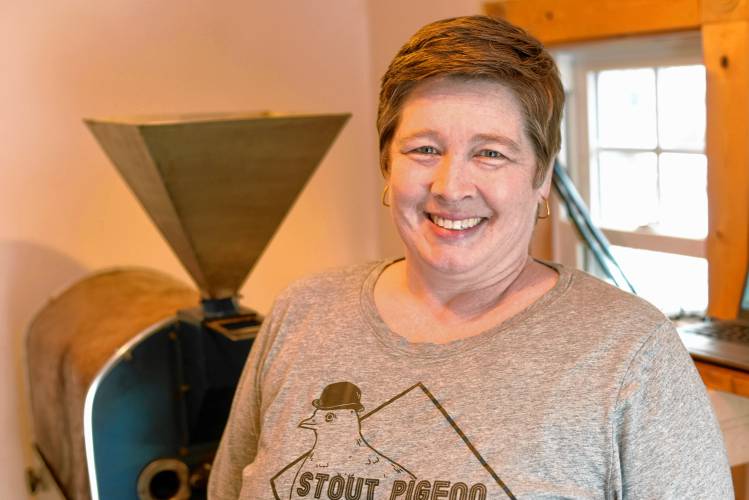 Ericka Almeida of Stout Pigeon Coffee with her 3-kilogram vintage drum roaster at her Turners Falls business.