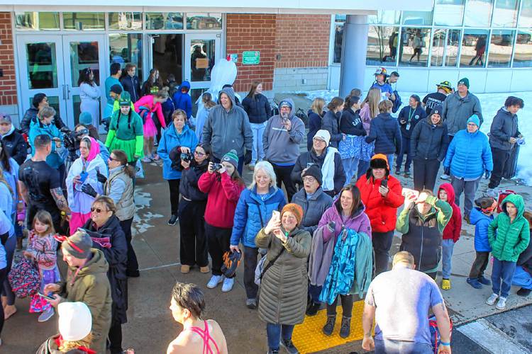 Spectators at Greenfield High School watch the polar plunge festivities on Thursday afternoon. 