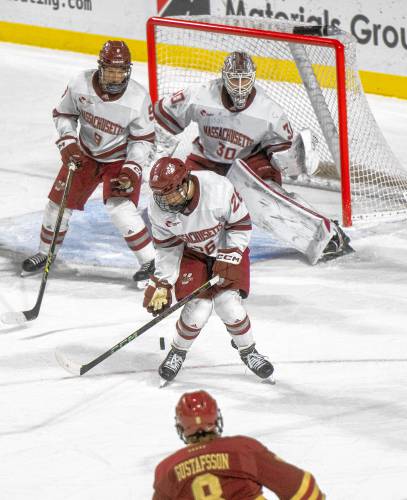 UMass defenseman Owen Murray (26) attempts to block a shot in front of goalie Michael Hrabal against Boston College last weekend at the Mullins Center. UMass defenseman Owen Murray (26) attempts to block a shot in front of goalie Michael Hrabal against Boston College last weekend at the Mullins Center.