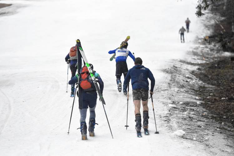 Racers make the climb up the mountain during the final leg of the Berkshire Highlands Pentathlon on Saturday at Berkshire East. Ben Jankowski (top right) leads the pack and was the overall winner of the race. 