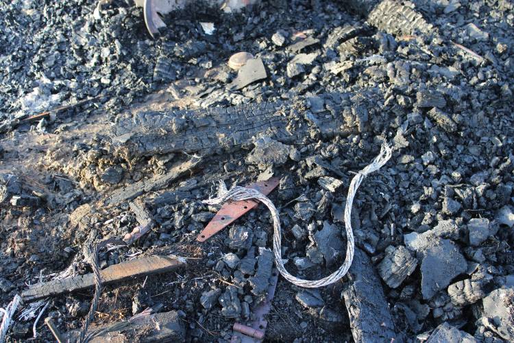 What is left of a lightning rod that was on the roof of a barn on Sabans Road in Conway that burned to the ground on Saturday.