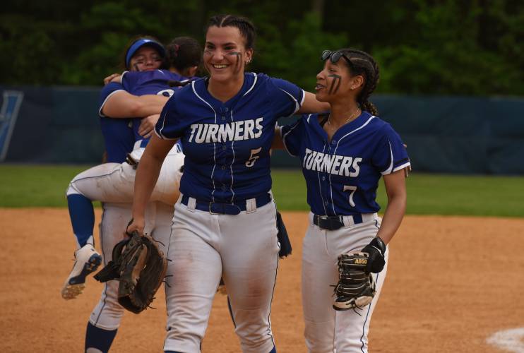 Turners Falls’ Madi Liimatainen, left, and Marilyn Abarua walk off the field after the Thunder’s 12-1 victory over Hoosac Valley in the Western Mass. Class D final on Wednesday at Westfield State University.