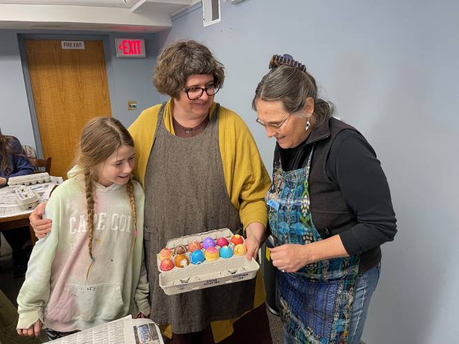 Ida Westley, her mother Anna Westley and pysanky workshop co-leader Mary Link admire the Westleys’ work during a workshop at Belding Memorial Library in Ashfield.