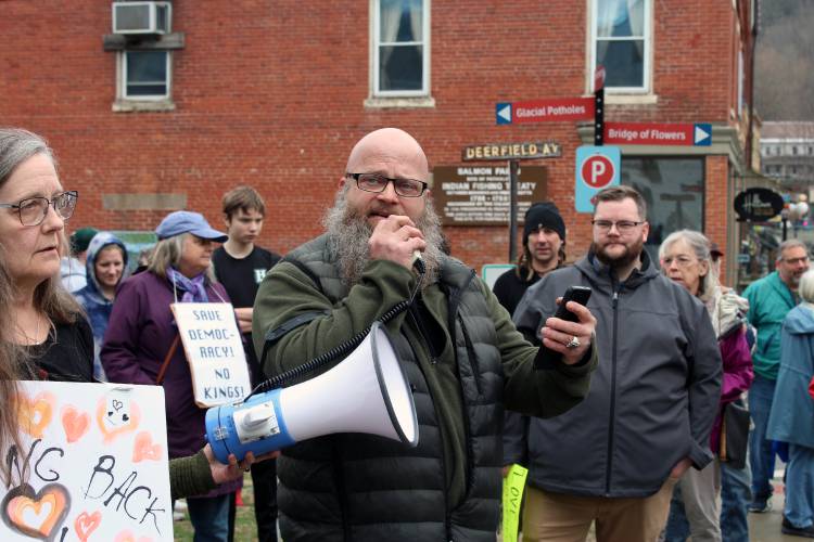 Chris Williams speaks at a protest against the Trump administration in Shelburne Falls on Saturday.