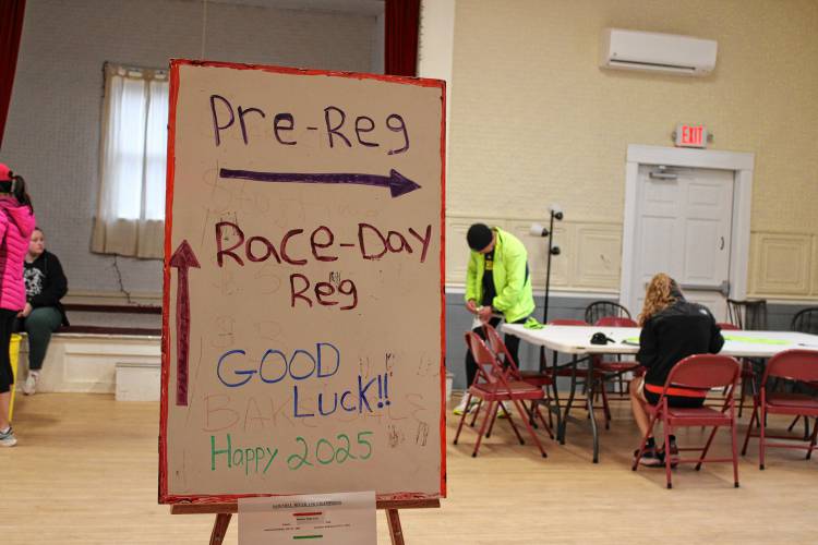 The sign inside the Montague Common Hall greeting runners to the Annual Sawmill 10k Race on New Years Day in Montague Center. The race was hosted by the Montague Parks and Recreation Department. 