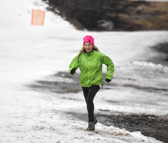 A racer makes her way to the transition area after the adventure run during the Berkshire Highlands Pentathlon on Saturday at Berkshire East. 