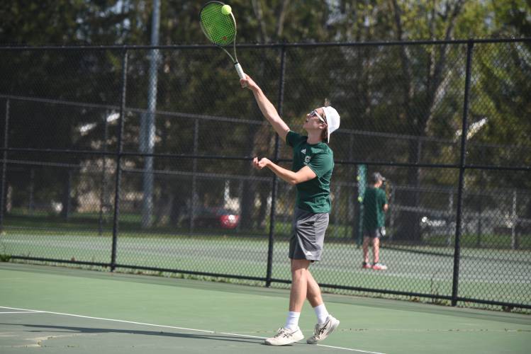 Greenfield's Palmer King competes in No. 1 singles against Frontier at the Davis Street Courts Friday. 