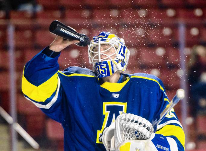 Alaska goalie Lassi Lehti (35) sprays water onto his face during the NCAA hockey game against UMass at the Mullins Center, Friday, Jan. 24, 2025, in Amherst.