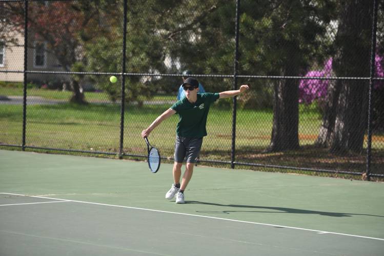 Greenfield's Shane Toomey competes in No. 2 singles against Frontier at the Davis Street Courts Friday. 