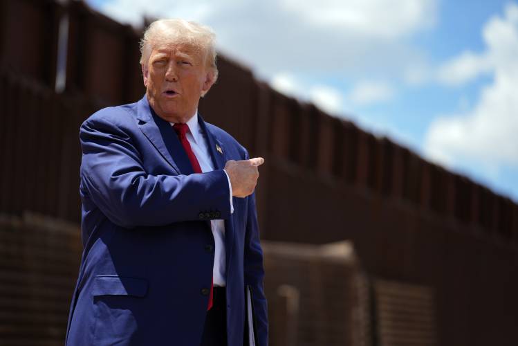 Then Republican presidential candidate Donald Trump speaks along the southern border with Mexico, on Aug. 22, 2024, in Sierra Vista, Ariz. Then Republican presidential candidate Donald Trump speaks along the southern border with Mexico, on Aug. 22, 2024, in Sierra Vista, Ariz.