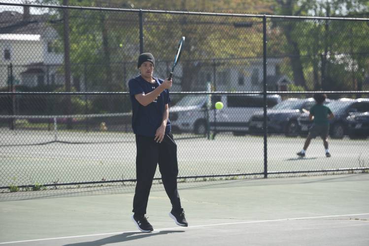 Frontier's Brayden Reipold competes in No. 2 singles against Greenfield at the Davis Street Courts Friday. 