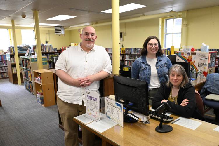 Wheeler Memorial Library Director Jason Sullivan-Flynn, Children’s Librarian April Violette and Children’s Services Assistant Kathryn Chaisson in the Children’s Room of the Wheeler Memorial Library that has been reopened after renovations.